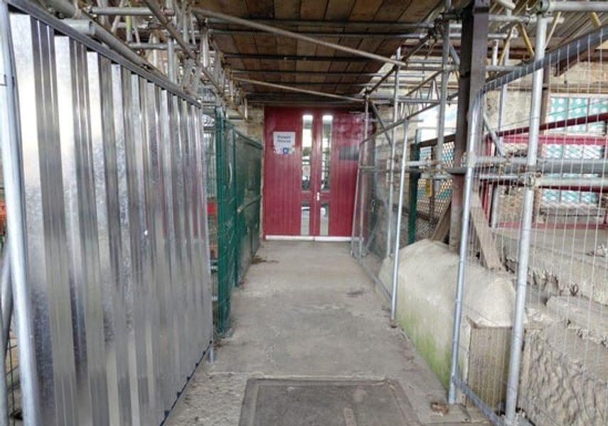 Passageway with scaffolding around