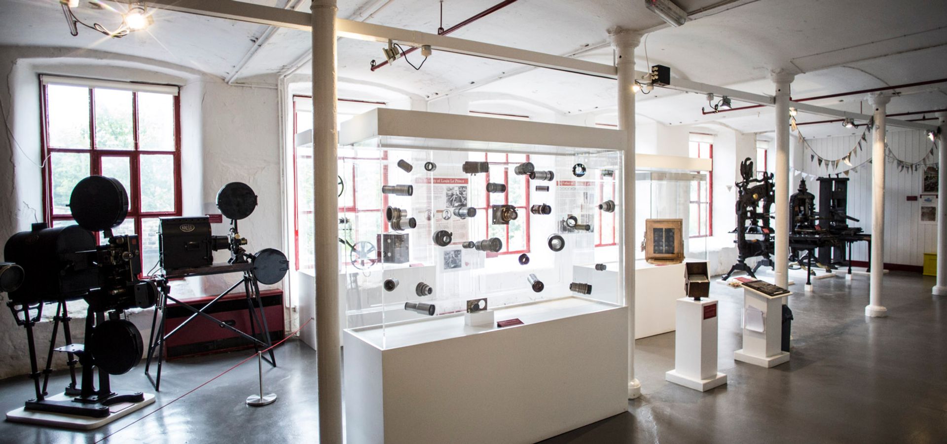 An exhibition space at Leeds Industrial Museum, filled with old cameras and filming equipment.