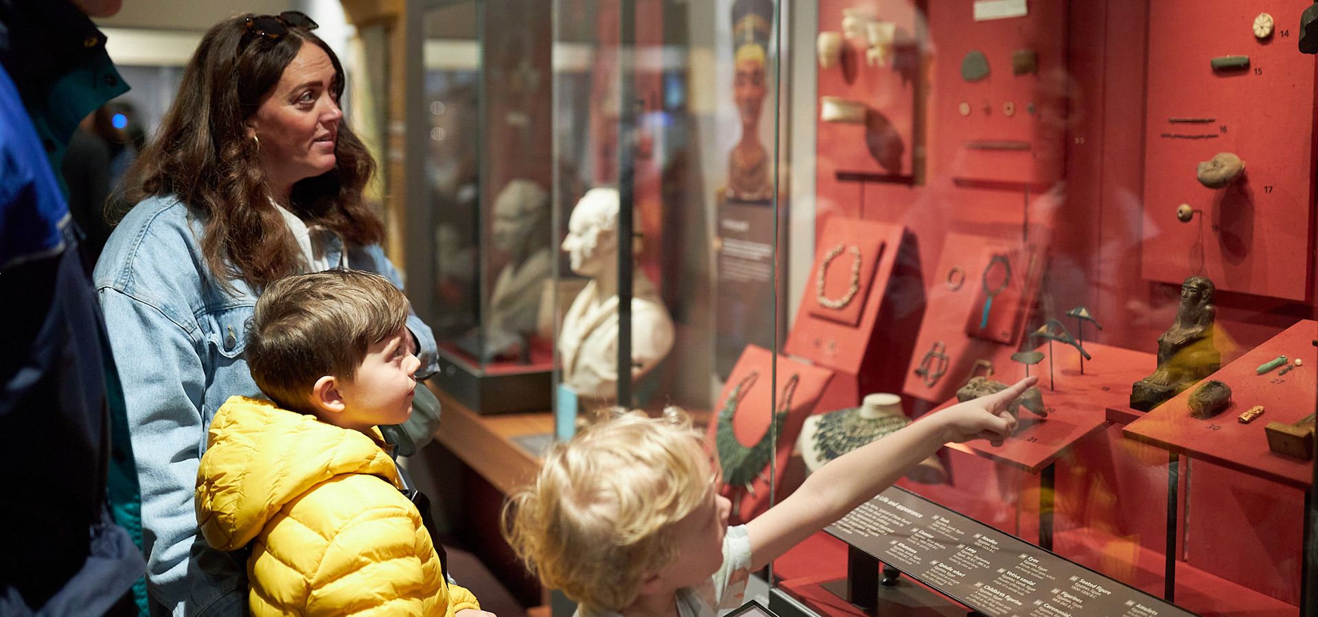 A family look at the Ancient Worlds gallery at Leeds City Museum.