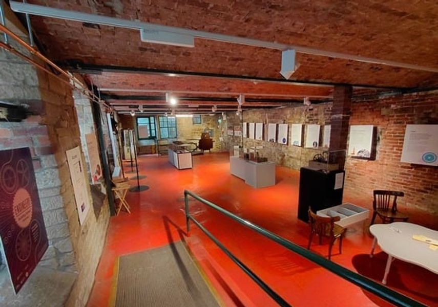 Photo of inside museum with orange floor
