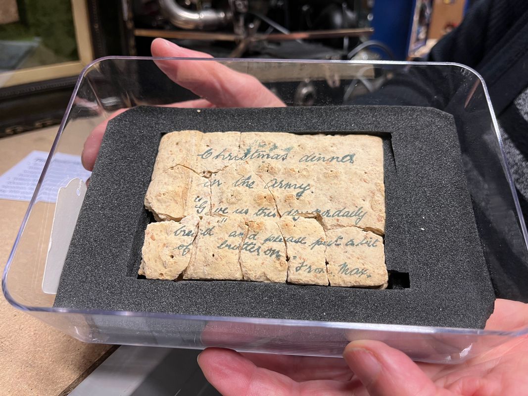 A biscuit from 1914 with a Christmas message on it 