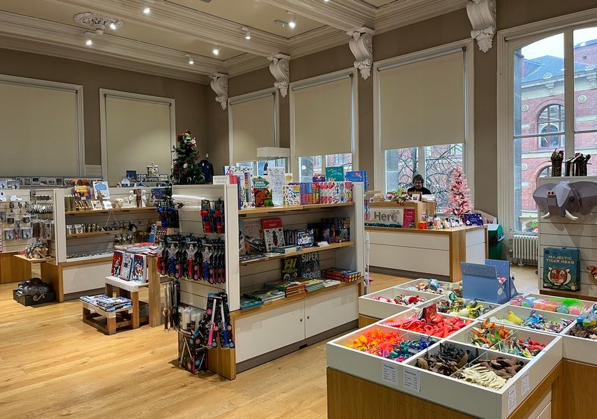 The Gift Shop in the Leeds City Museum with shelves displaying toys and souvenirs.