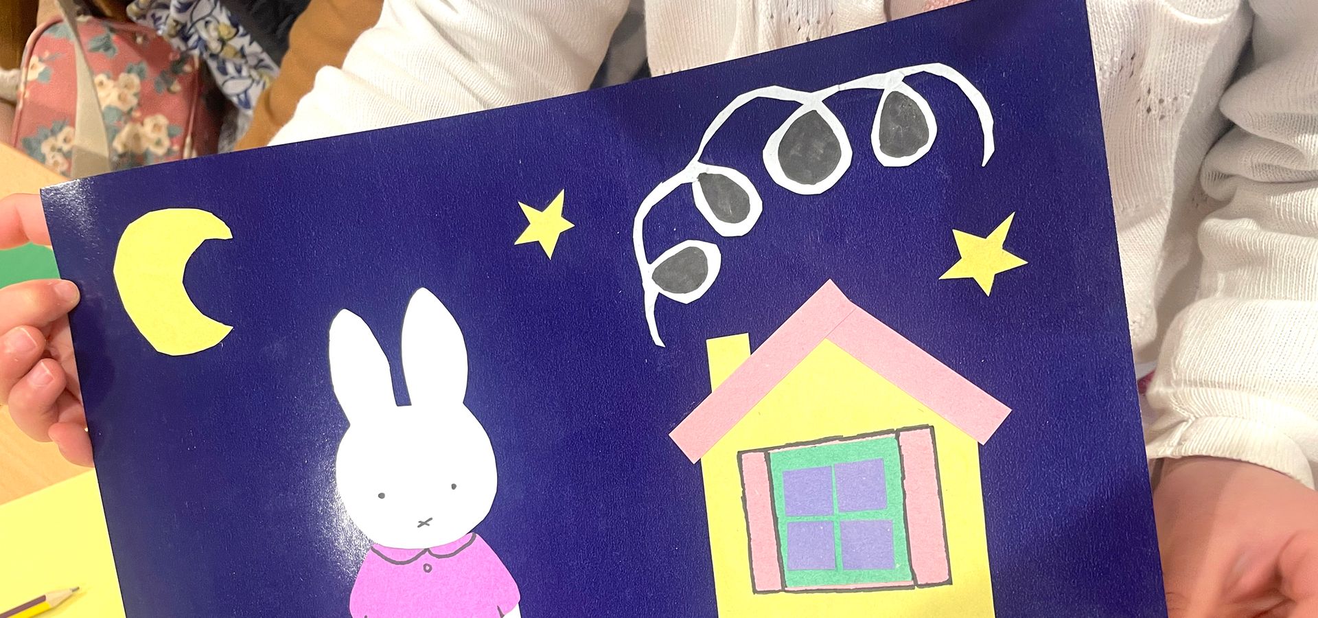 child's art with miffy, a house, moon and stars