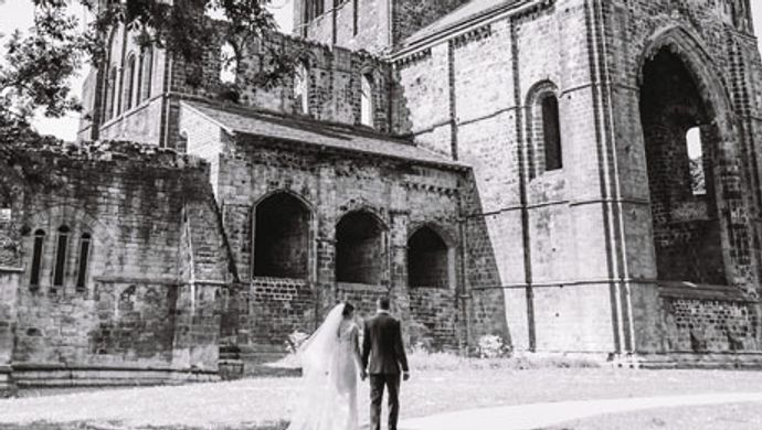 A wedding couple at Kirkstall Abbey