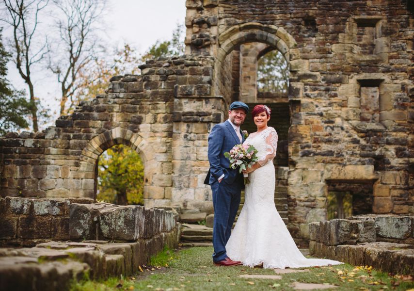 A couple on their wedding day at Kirkstall Abbey