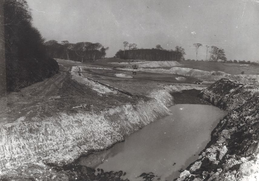 A black and white image of an open cast mine