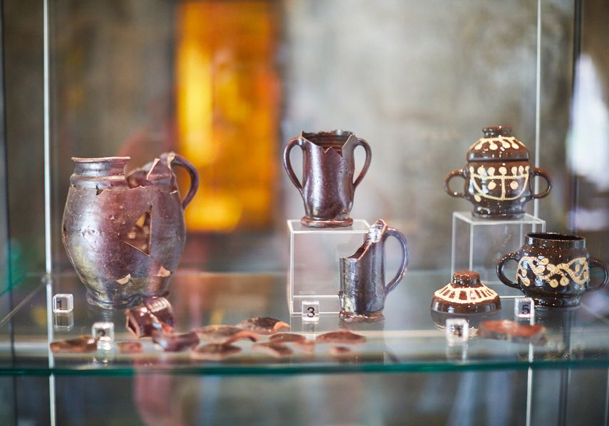 A cabinet of items found in the ruins of Kirkstall Abbey