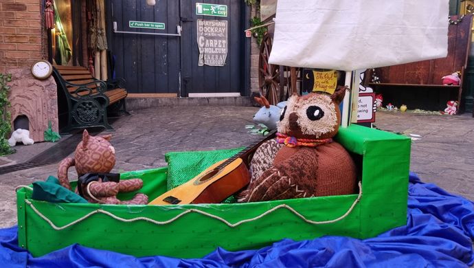 Owl and the pussy cat toy characters in the Victorian Streets of Abbey house museum