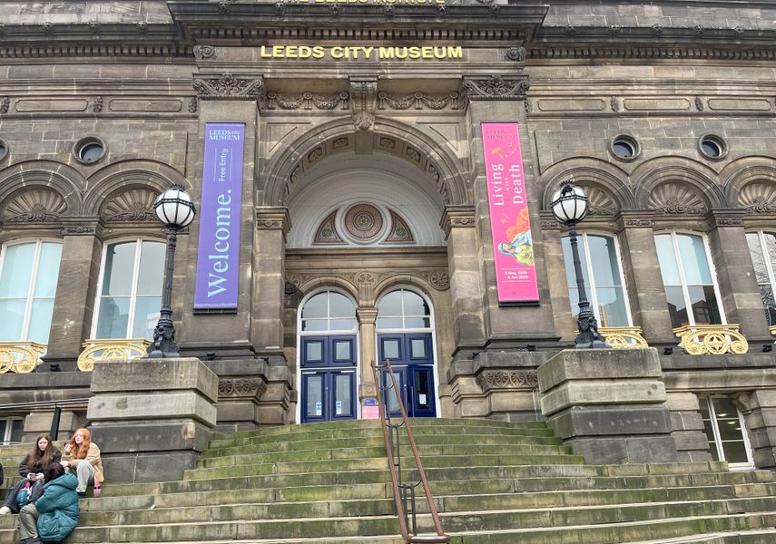 The staircase in front of Leeds City Museum. The blue doors of the museum are at the top of the stairs.